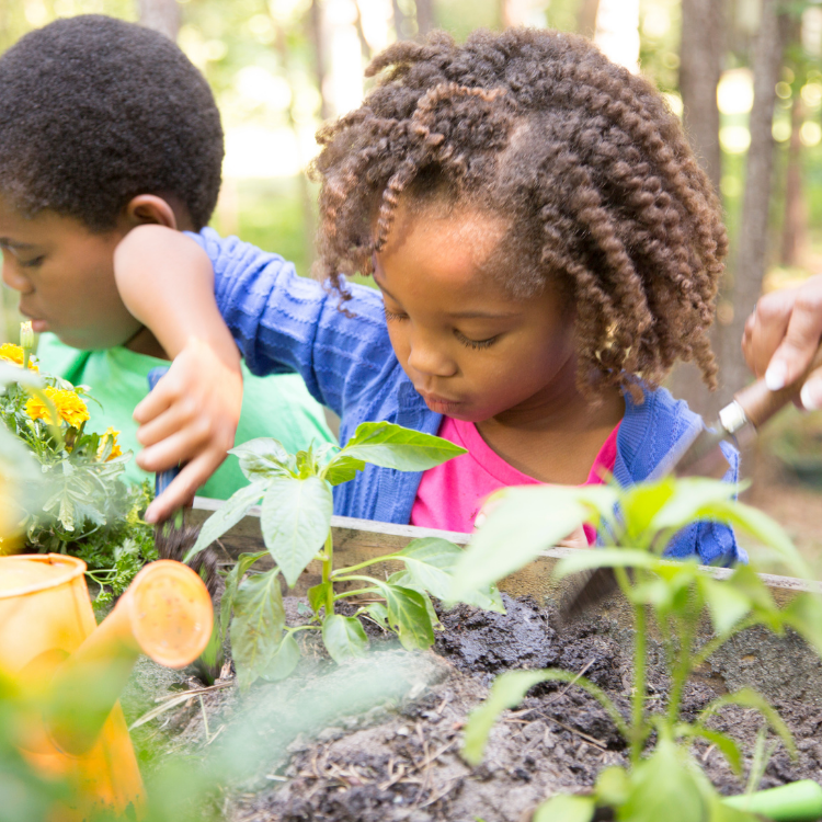 May-blog-1 Young children tending the soil of their garden